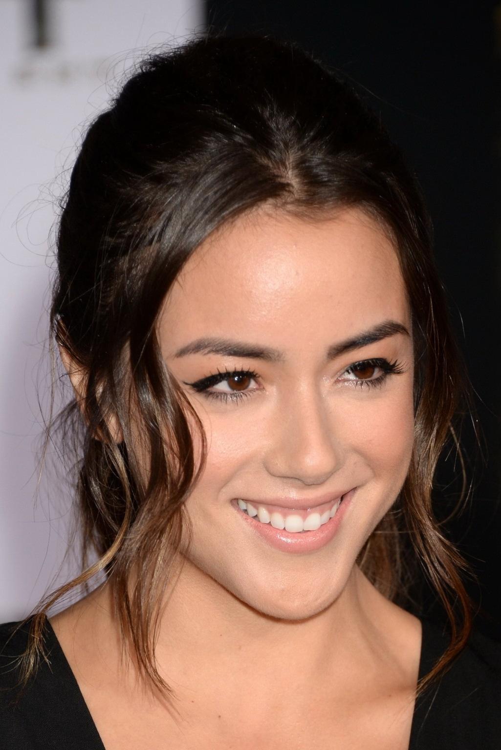 16P Chloe Bennet braless showing huge cleavage in a short black outfit at the Thor:T