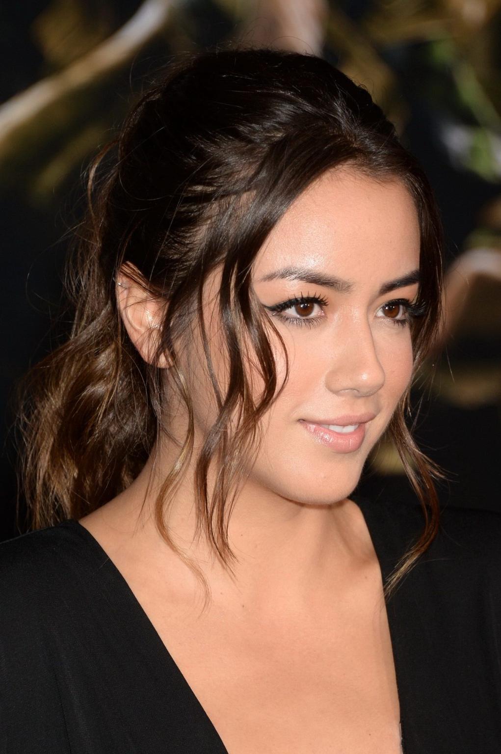 16P Chloe Bennet braless showing huge cleavage in a short black outfit at the Thor:T