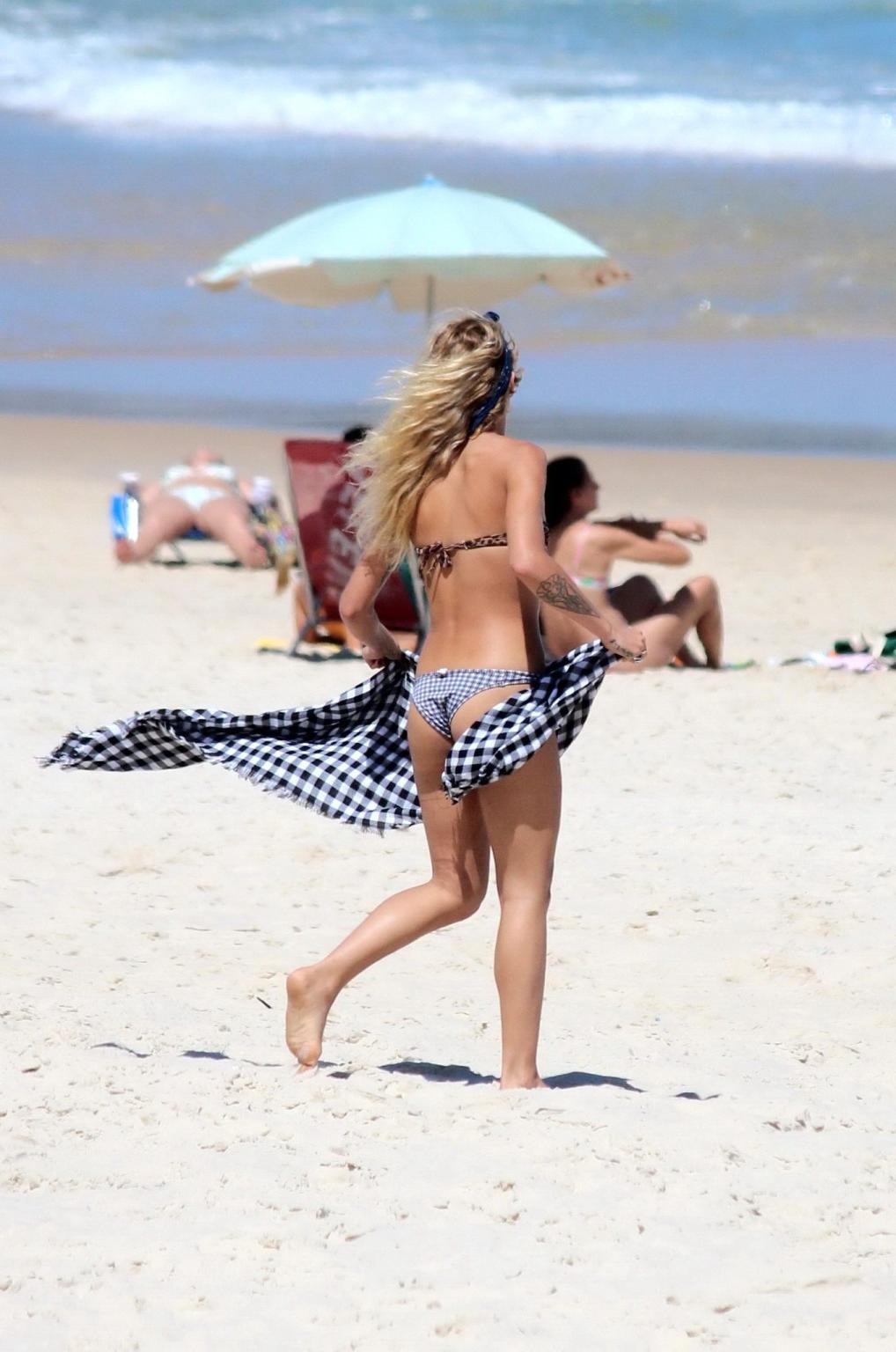 16P Alice Dellal bikini nip slip on a beach in Rio de Janeiro