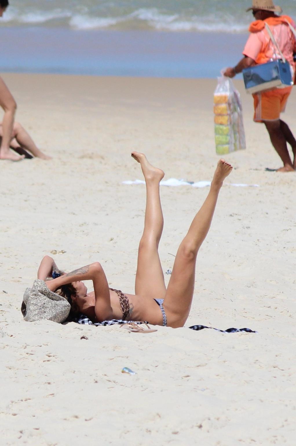 16P Alice Dellal bikini nip slip on a beach in Rio de Janeiro