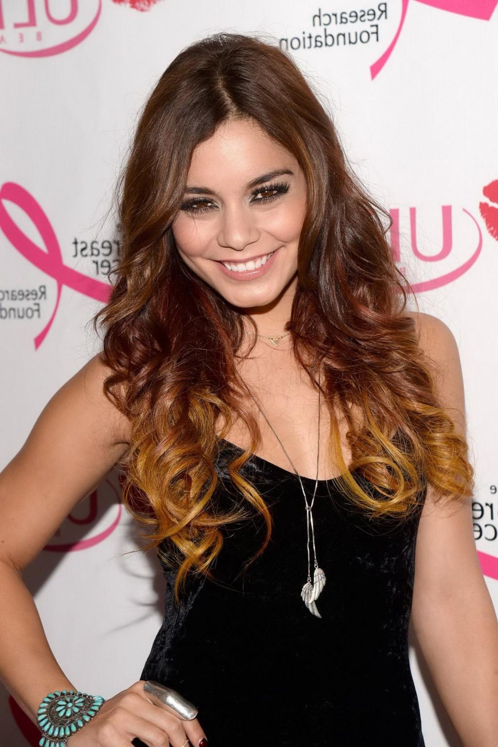 16P Vanessa Hudgens showing big cleavage in a tight black dress at 2013 ULTA Beauty 