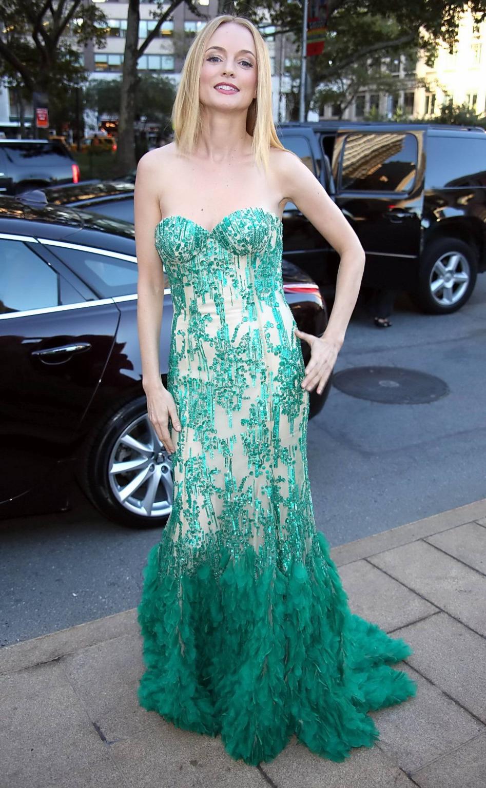 16P Heather Graham showing big cleavage in a tube mermaid design dress at the Metrop