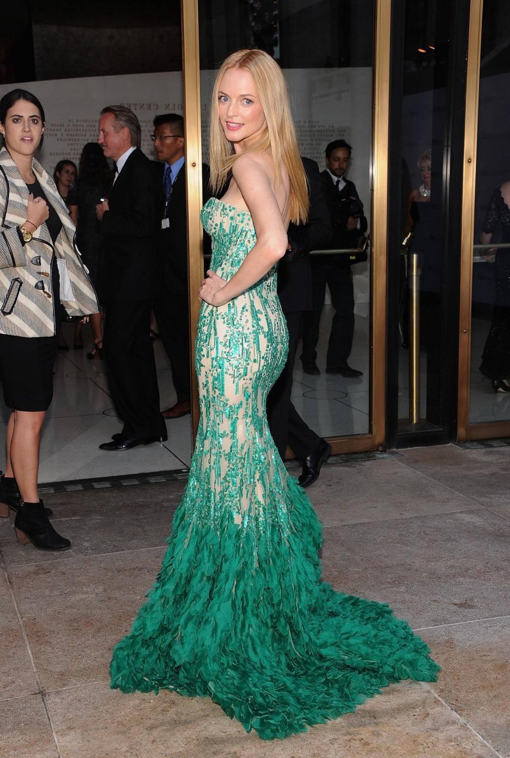 16P Heather Graham showing big cleavage in a tube mermaid design dress at the Metrop