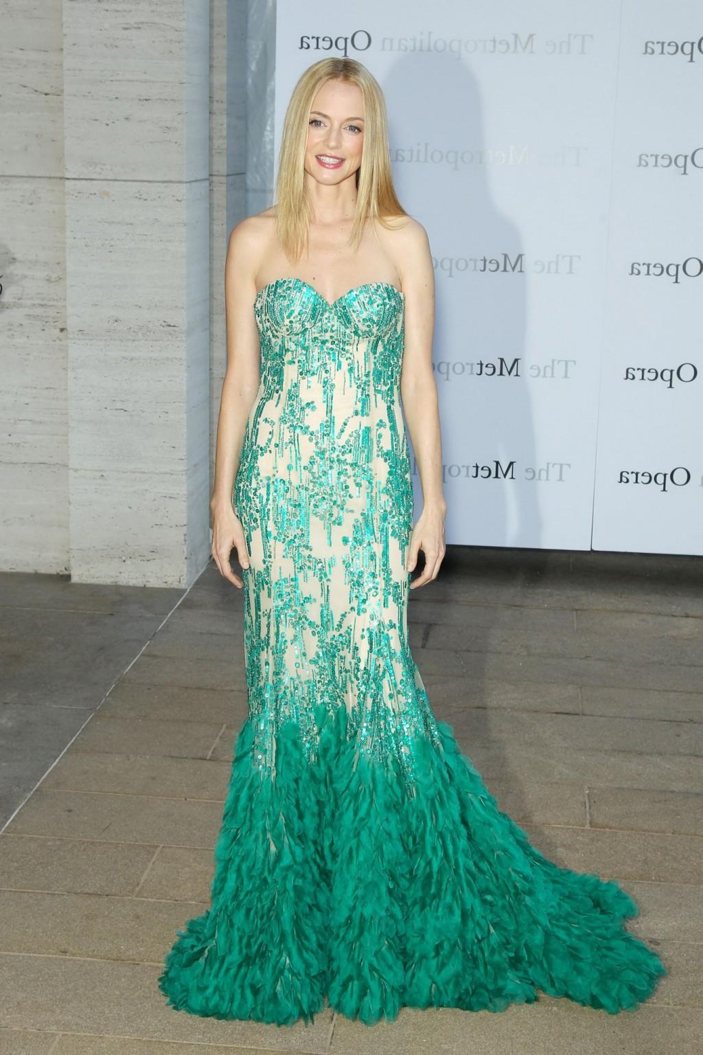 16P Heather Graham showing big cleavage in a tube mermaid design dress at the Metrop