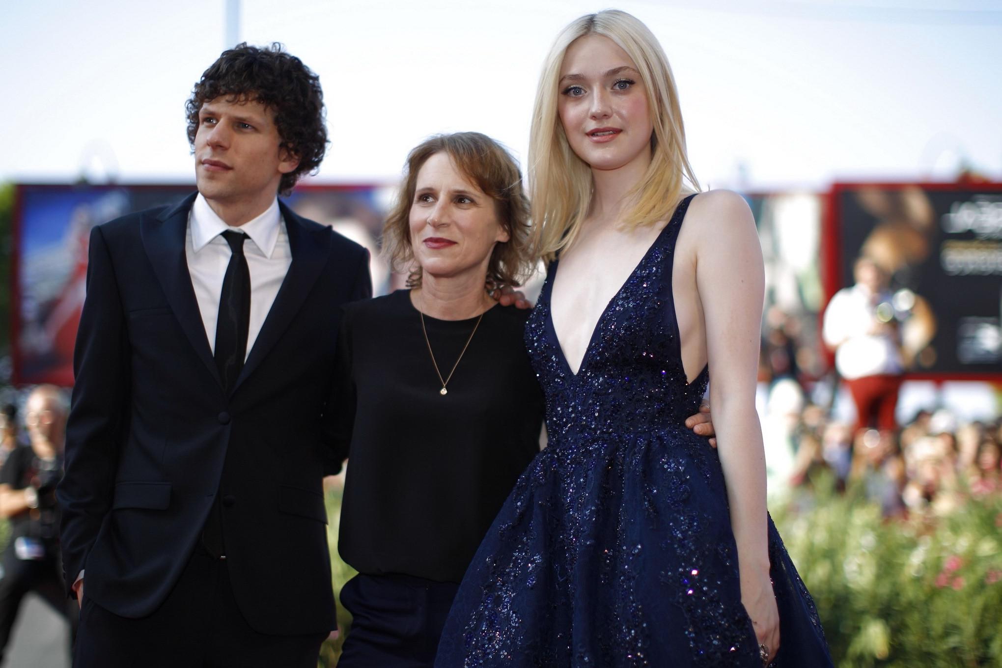 16P Dakota Fanning braless showing huge cleavage in shiny black dress at Night Moves
