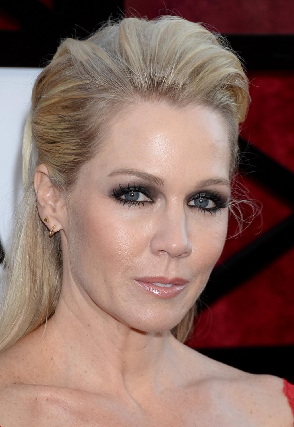 16P Jennie Garth cleavy wearing a red lace dress at the Comedy Central's 'Roast of J