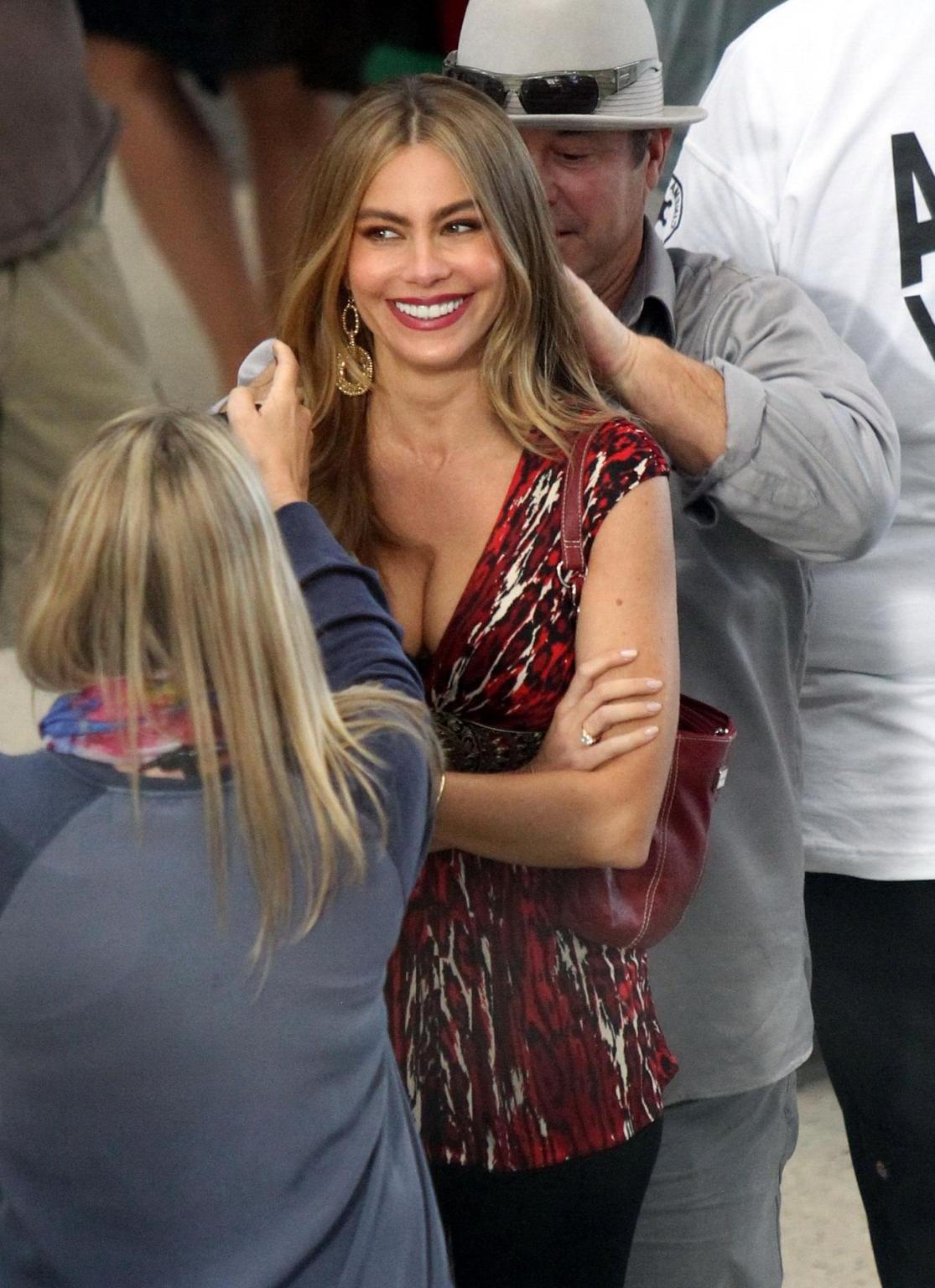16P Sofia Vergara showing huge cleavage on the set of 'Modern Family' at LAX Airport