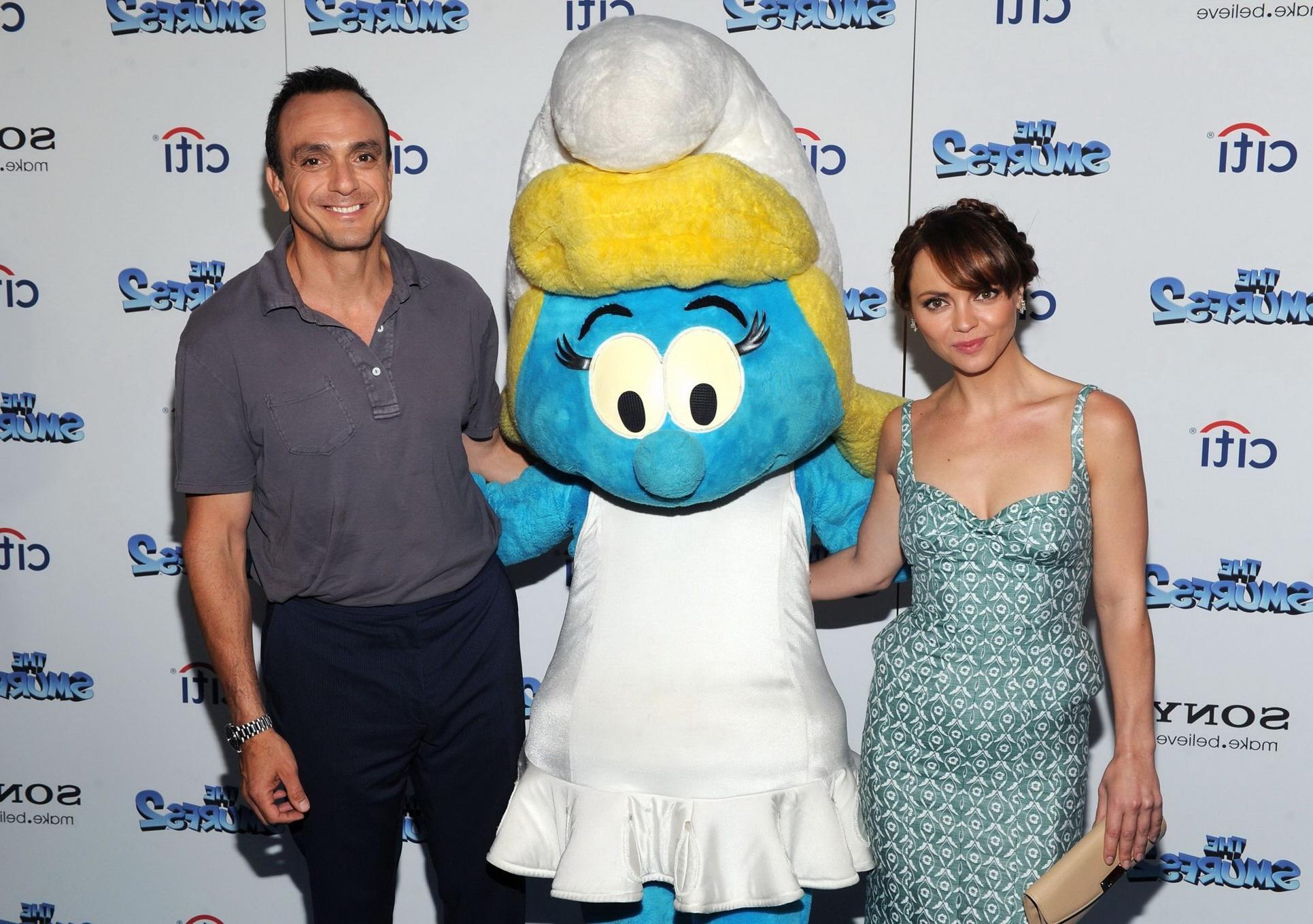 16P Christina Ricci showing big cleavage in a low cut indeterminate colored dress at