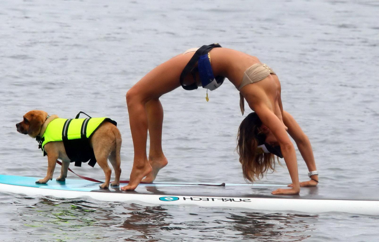 16P Leilani Dowding nip slip while doing bridge on a paddle board in Malibu