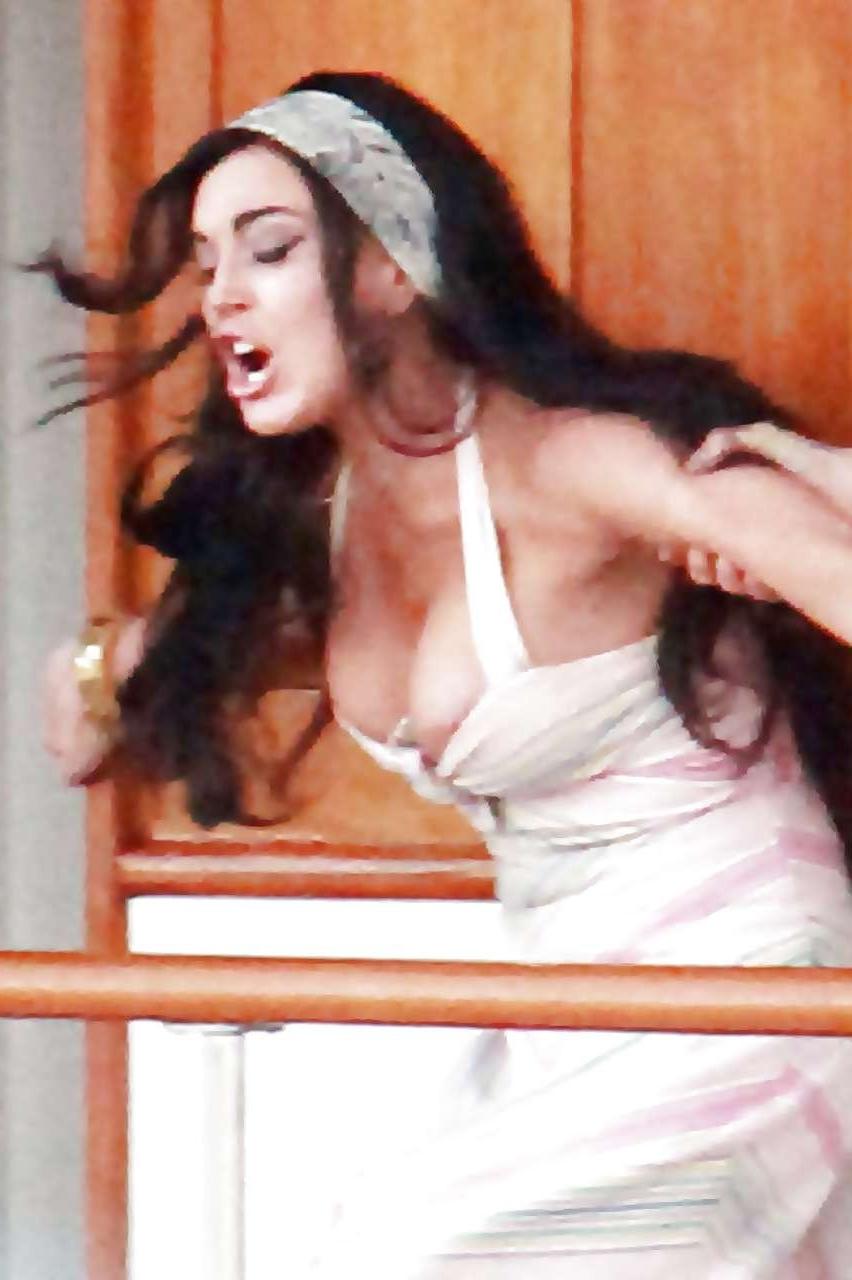 16P Lindsay Lohan exposing niples slip and see thru on street
