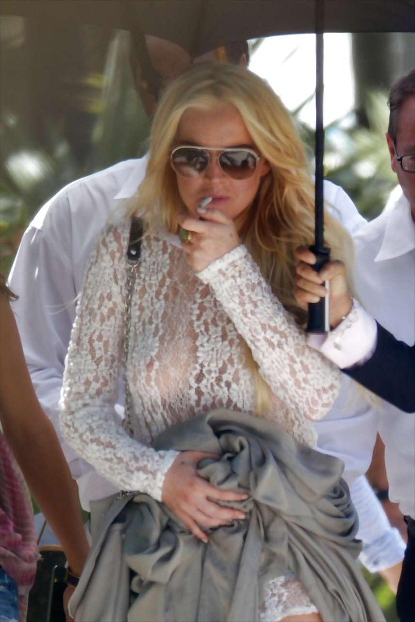 16P Lindsay Lohan exposing niples slip and see thru on street