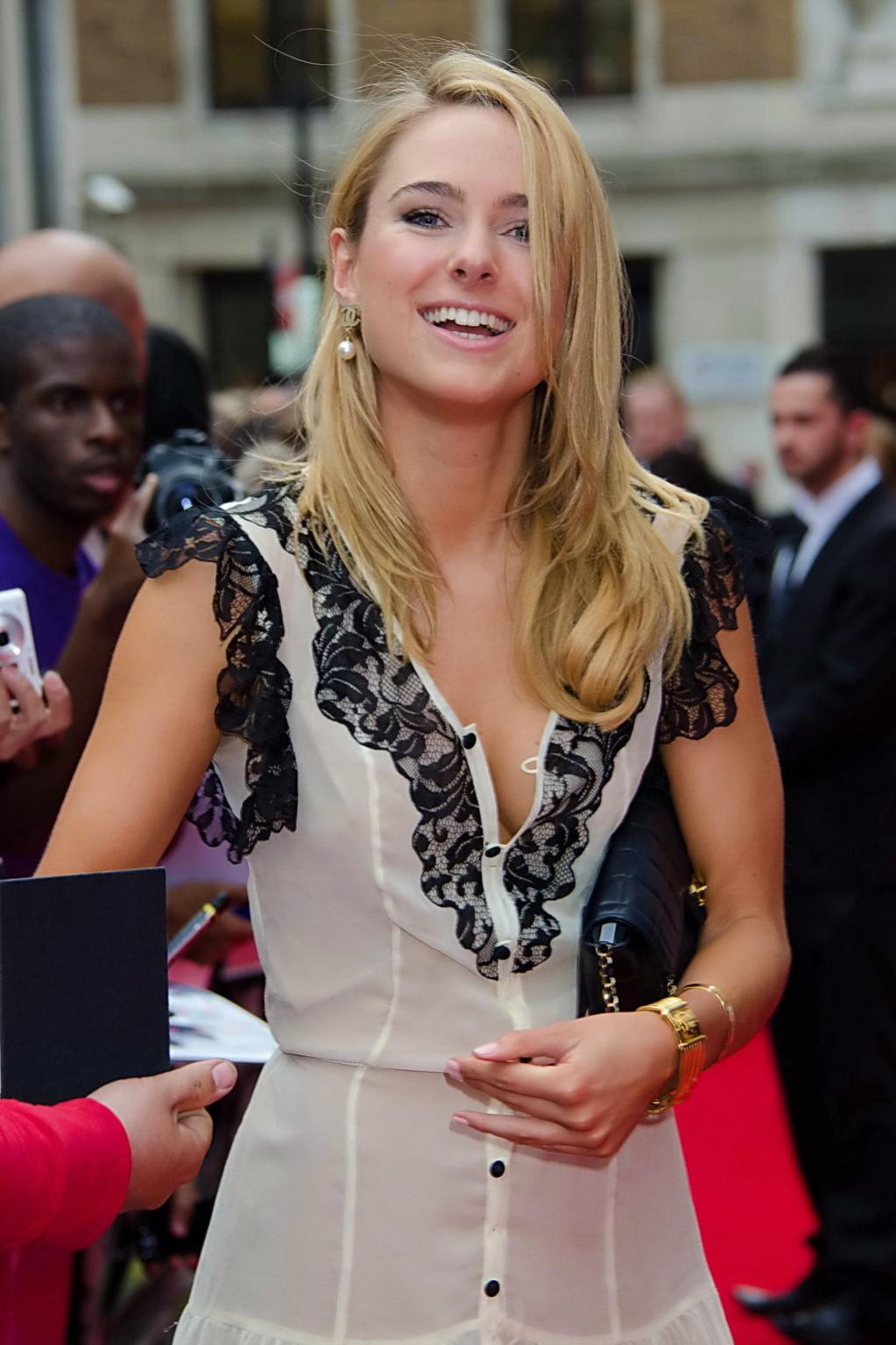 16P Kimberley Garner cleavy and leggy wearing see-through lace mini dress at the Hum