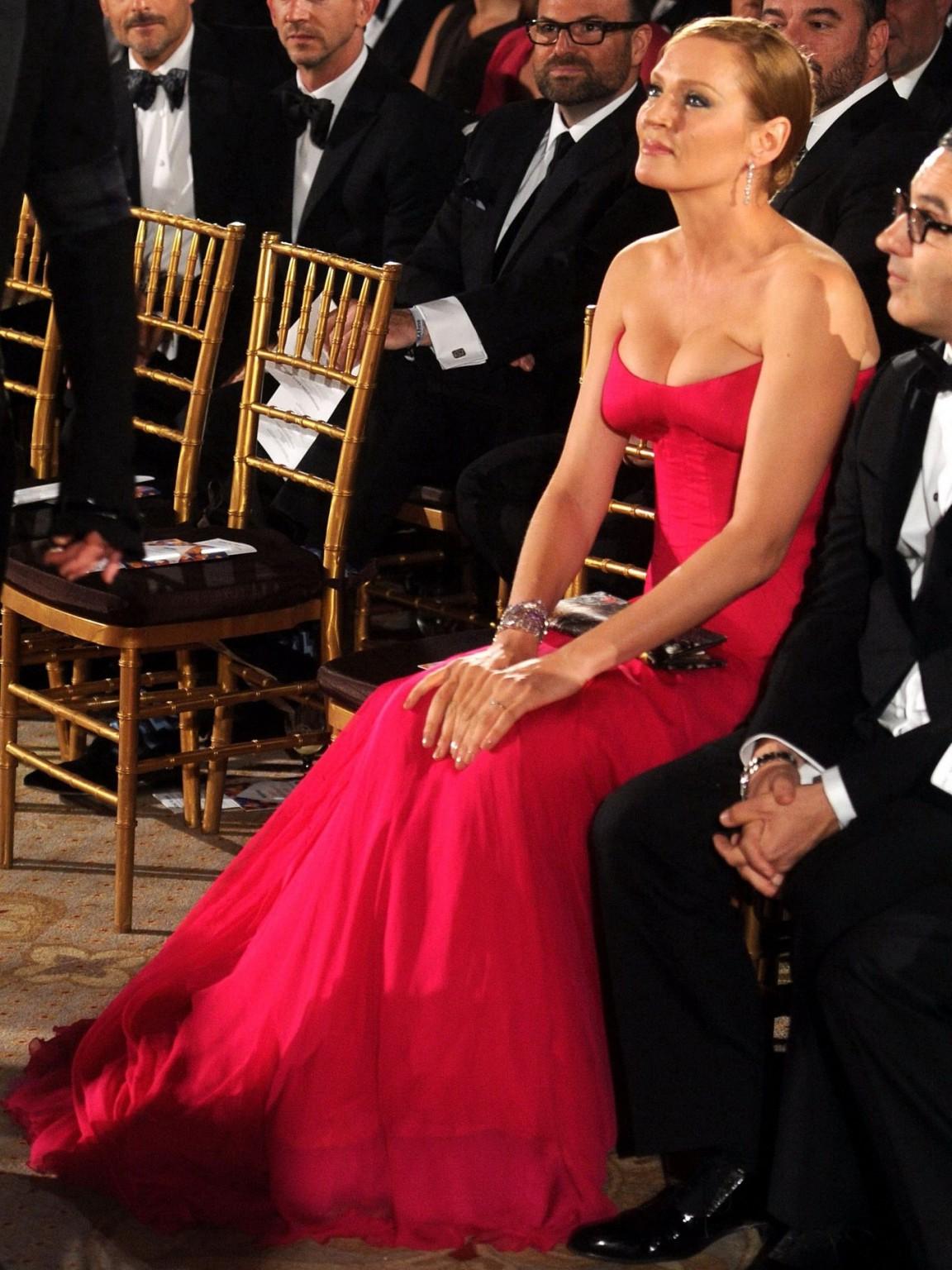 16P Uma Thurman shows huge cleavage wearing a low cut dress at the 4th Annual amfAR 