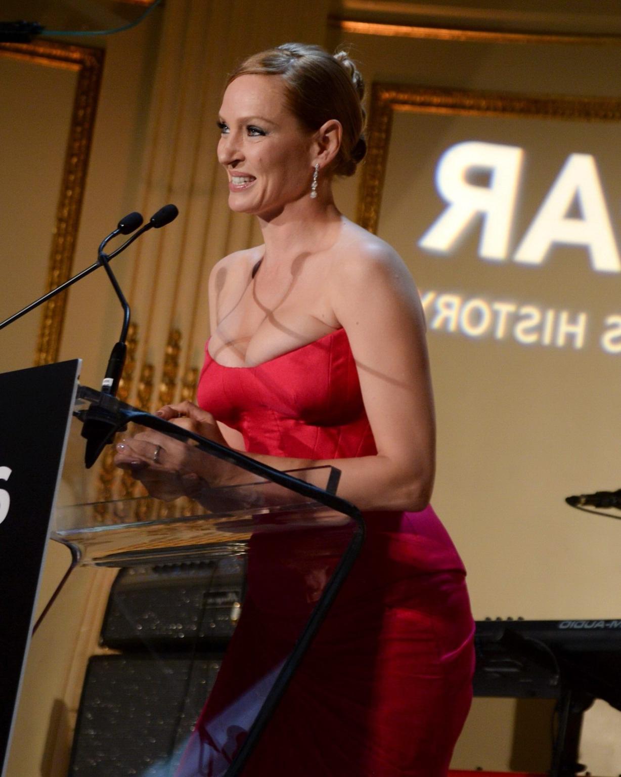16P Uma Thurman shows huge cleavage wearing a low cut dress at the 4th Annual amfAR 