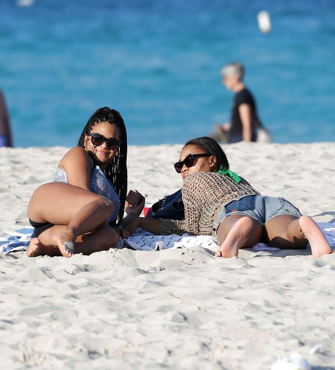 16P Christina Milian exposing nipples slip in bikini on beach