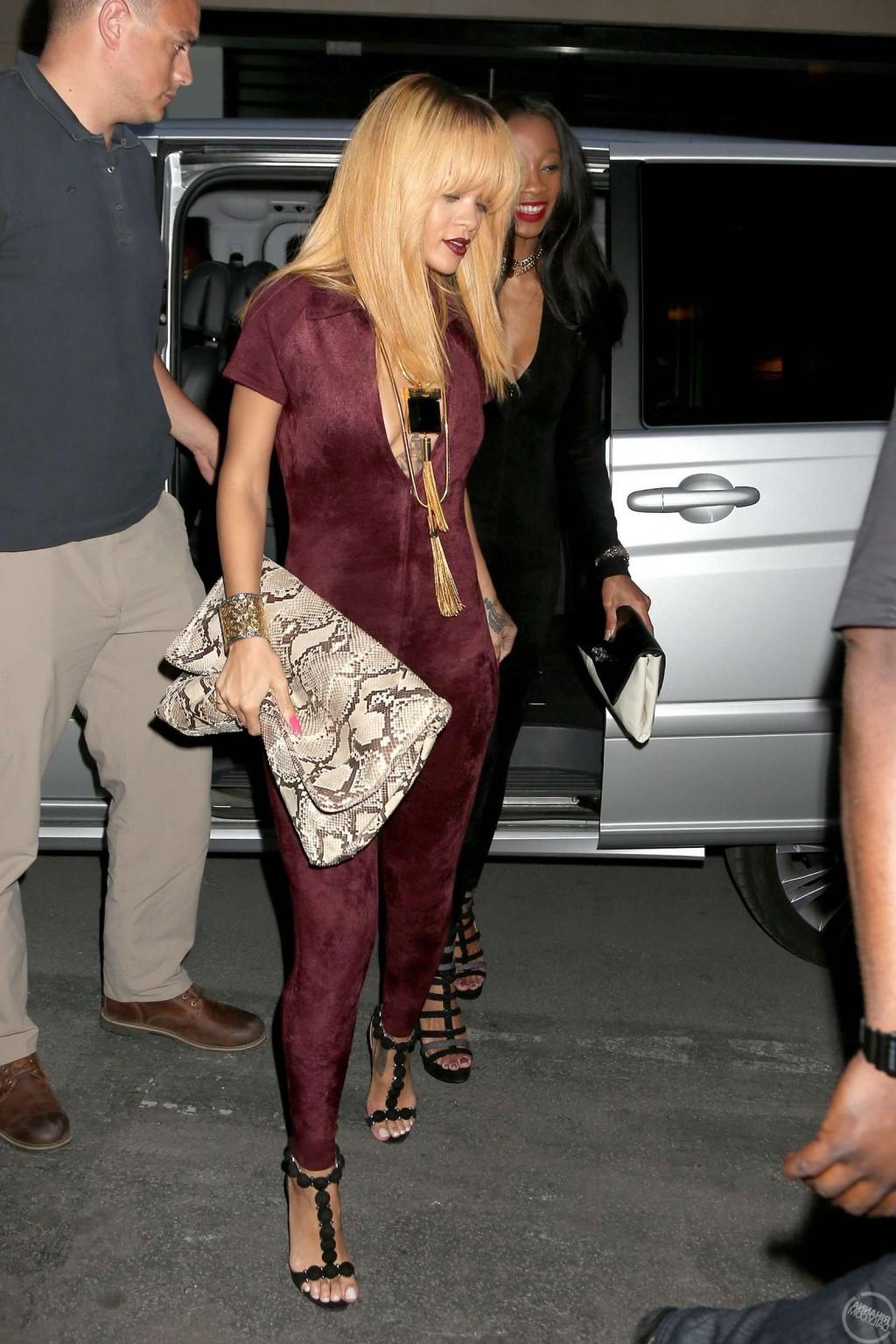 16P Rihanna braless showing huge cleavage in a red tight bodysuit out in Paris