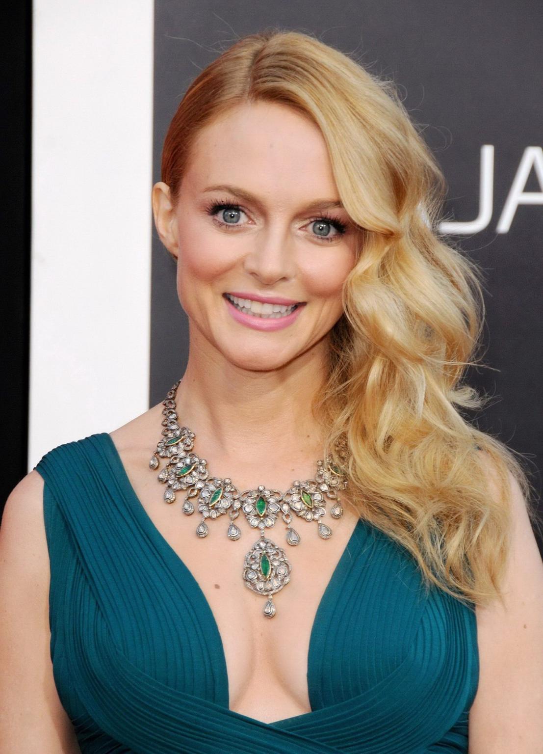 16P Heather Graham showing huge cleavage braless in a green low cut dress at the Han