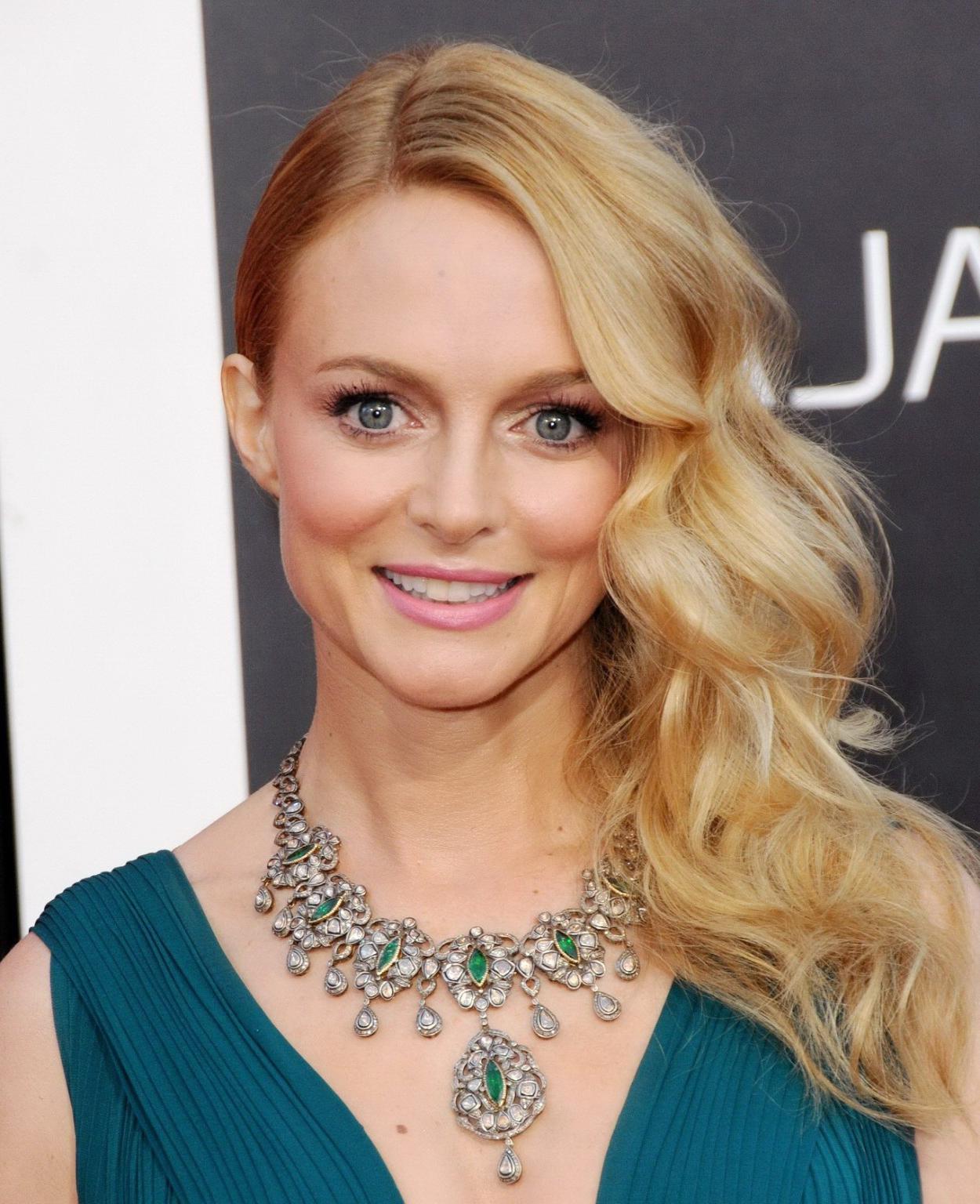 16P Heather Graham showing huge cleavage braless in a green low cut dress at the Han