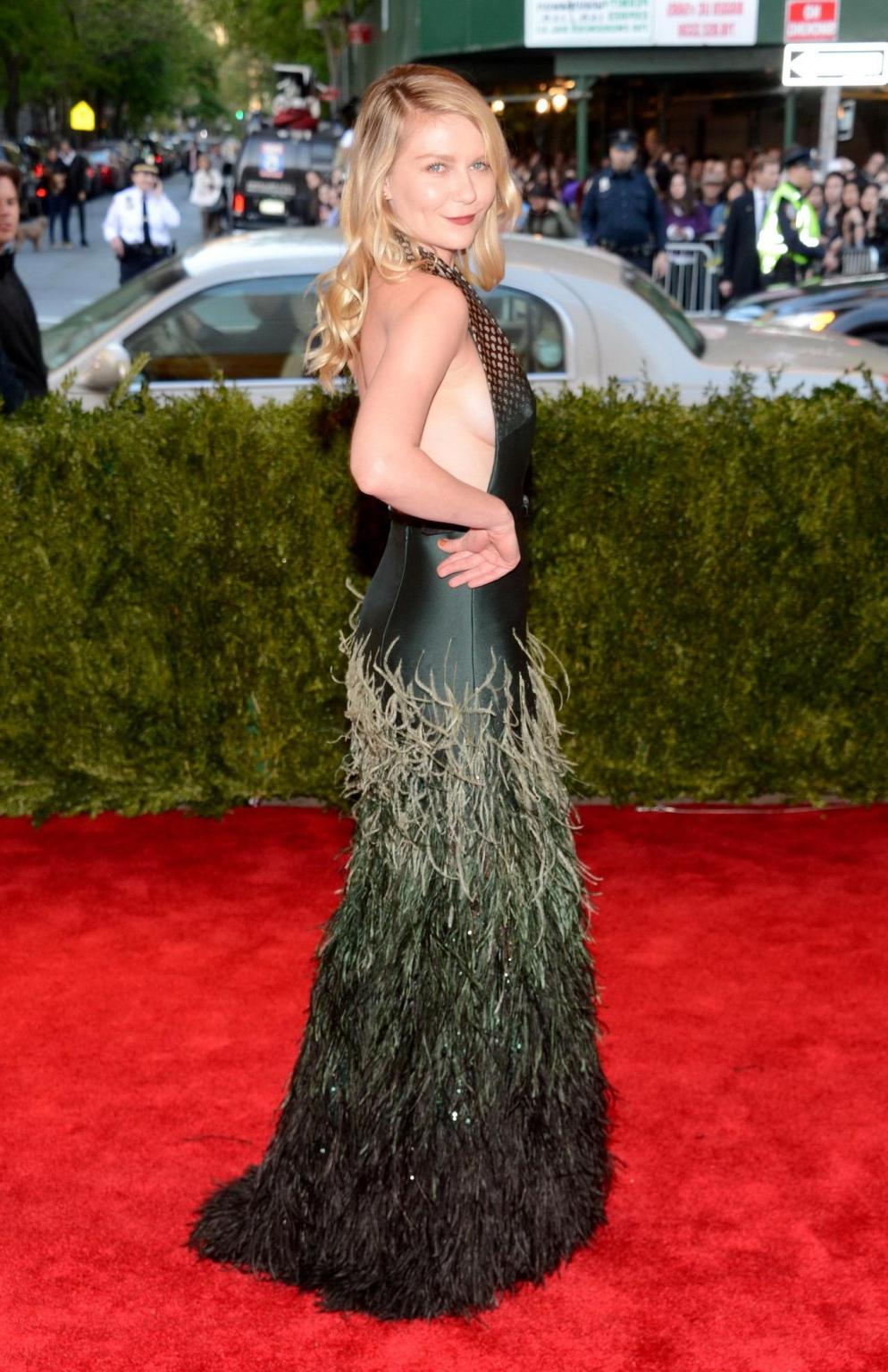 16P Braless Kirsten Dunst showing cleavage  side boob at the 2013 Met Gala in NYC