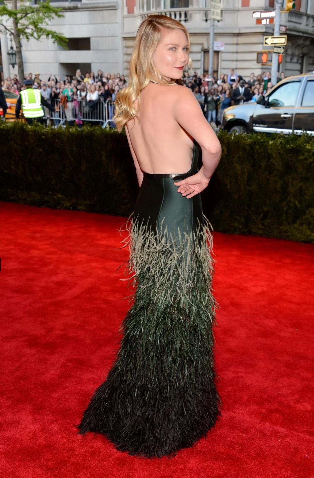 16P Braless Kirsten Dunst showing cleavage  side boob at the 2013 Met Gala in NYC