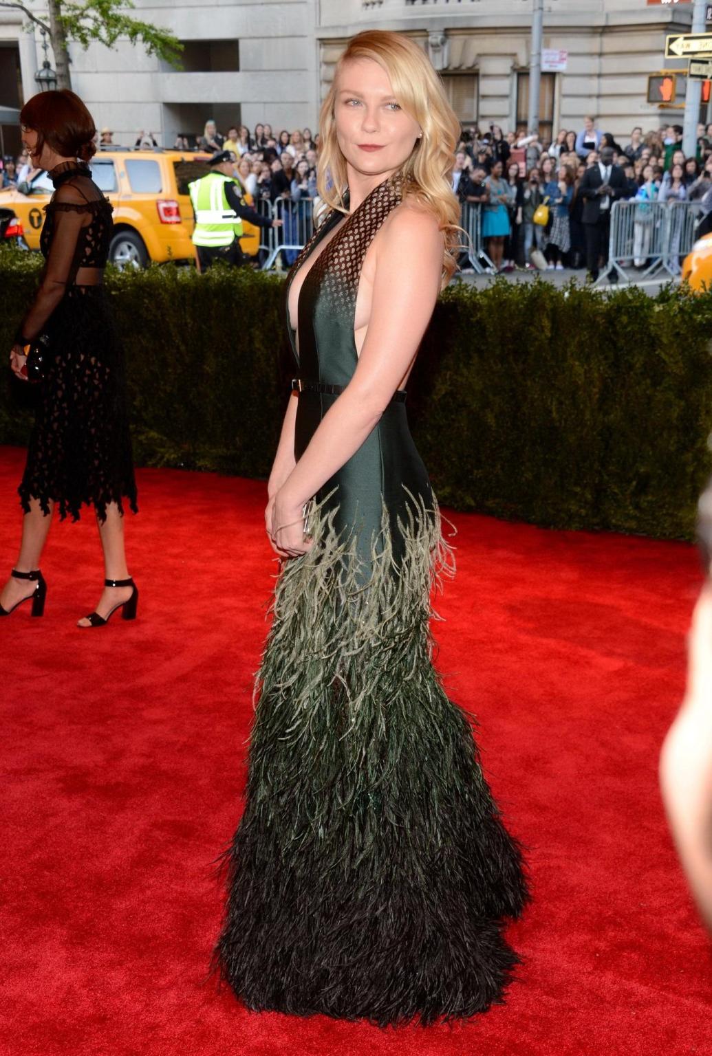 16P Braless Kirsten Dunst showing cleavage  side boob at the 2013 Met Gala in NYC