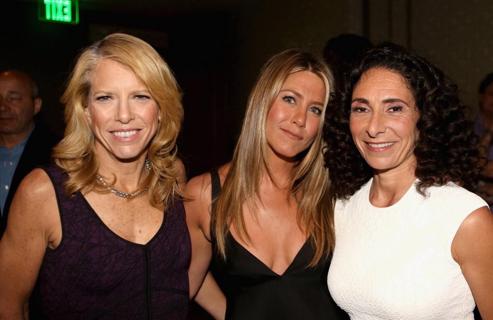 16P Jennifer Aniston showing cleavage at the Yogalosophy book launch in LA