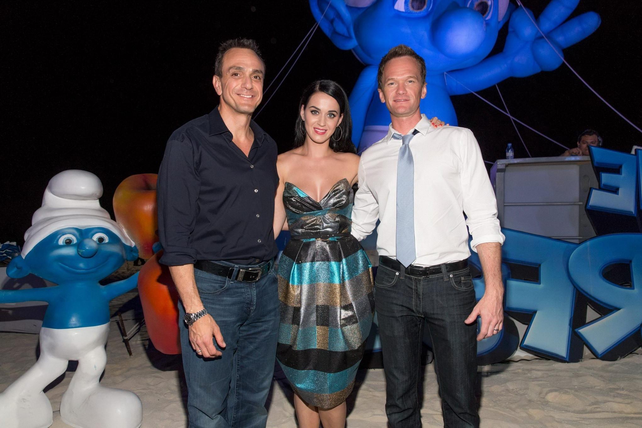 16P Katy Perry showing big cleavage in a hot strapless dress at The Smurfs 2 party a