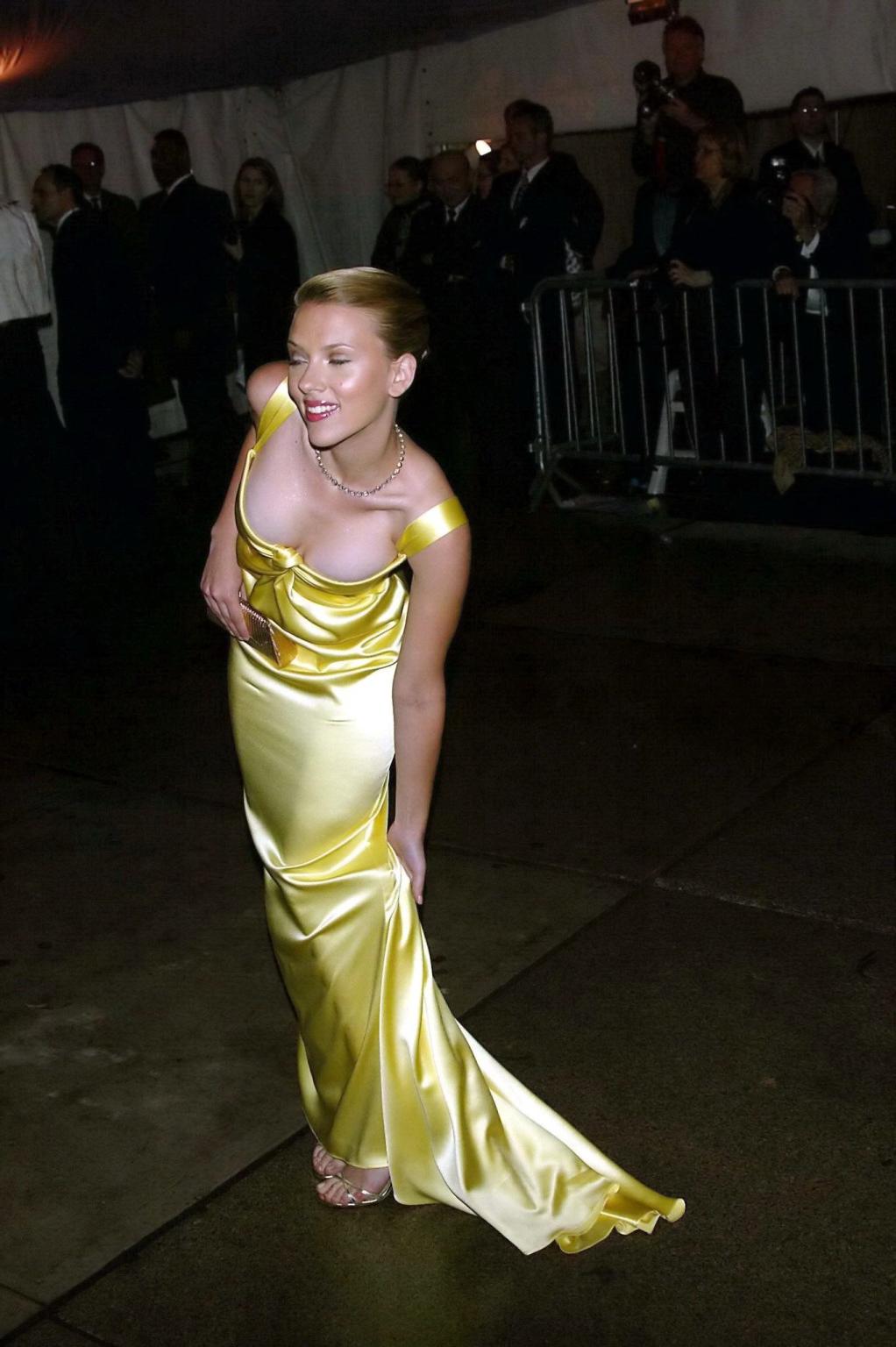 16P Scarlett Johansson braless showing epic cleavage in a yellow Calvin Klein dress 