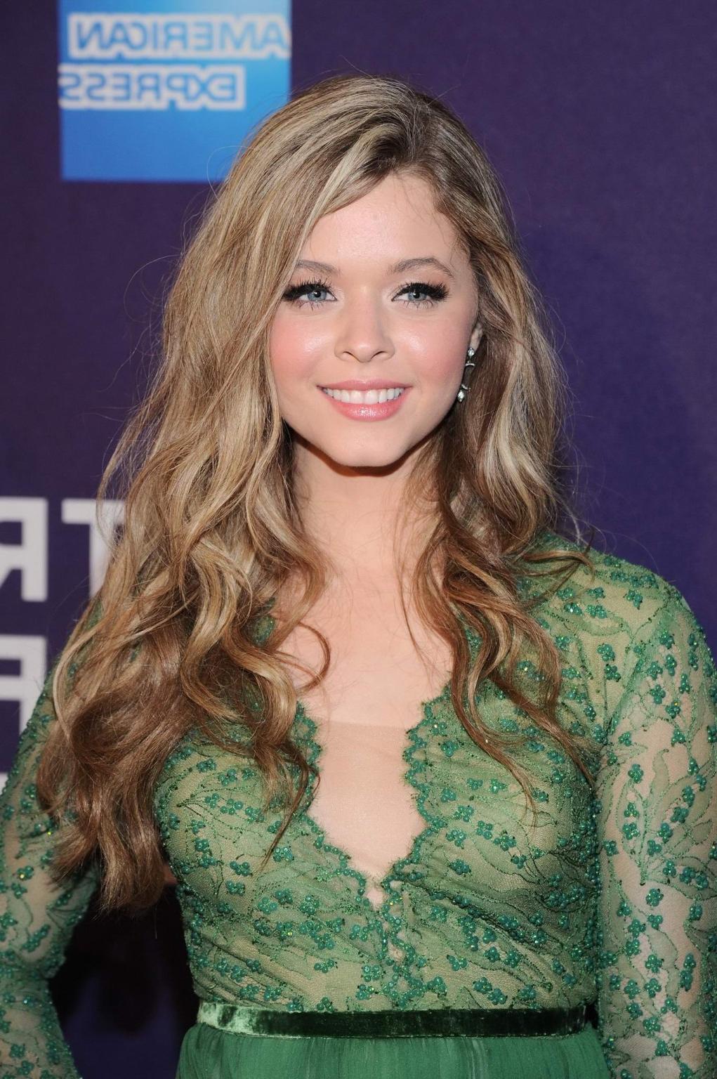16P Sasha Pieterse showing big cleavage in a short green transparent dress at the Tr