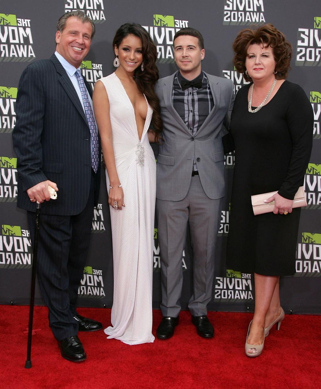 16P Melanie Iglesias braless showing huge cleavage in a white mahi dress at 2013 MTV