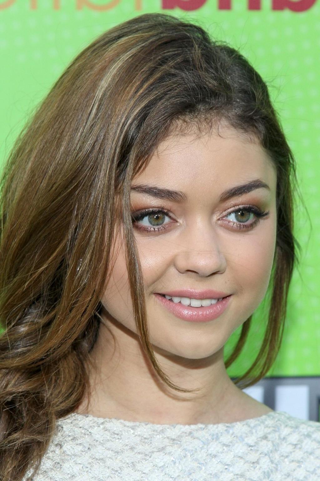 16P Sarah Hyland wearing retro white mini dress at the Skip And Donate Gala Event in