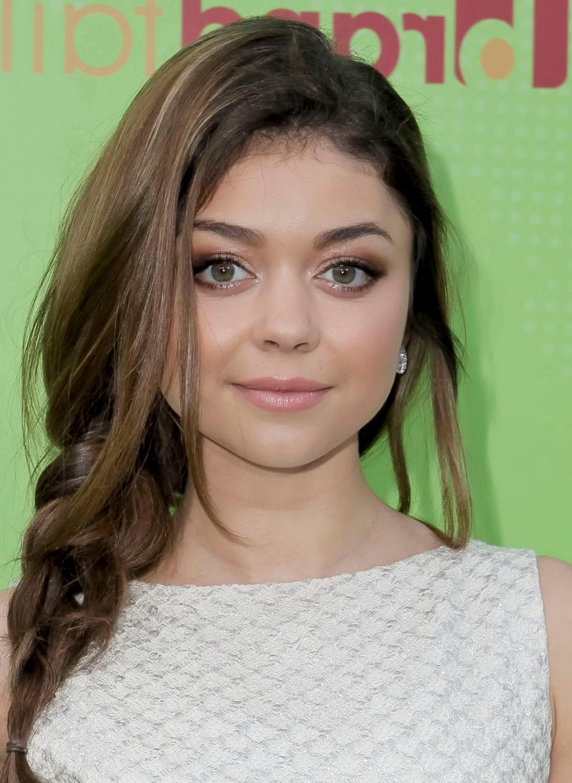 16P Sarah Hyland wearing retro white mini dress at the Skip And Donate Gala Event in