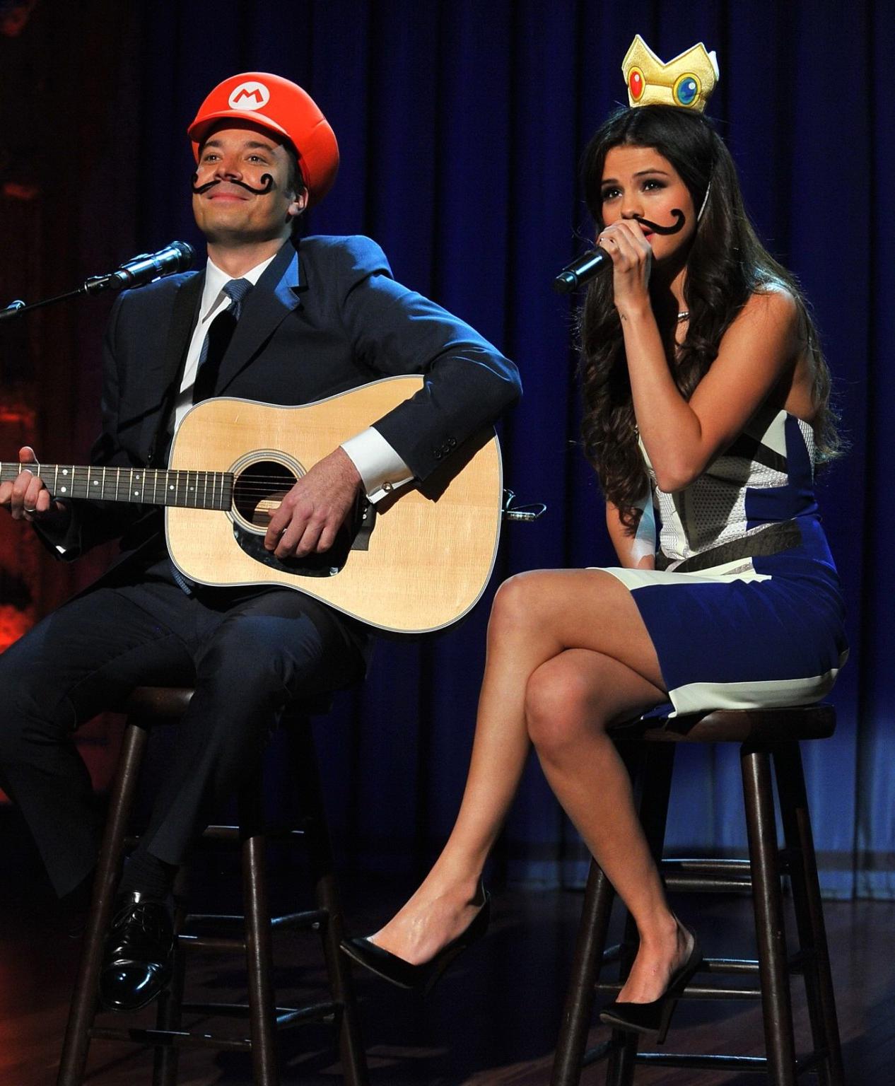 16P Selena Gomez shows huge cleavage wearing a strapless dress at 'The Late Night wi
