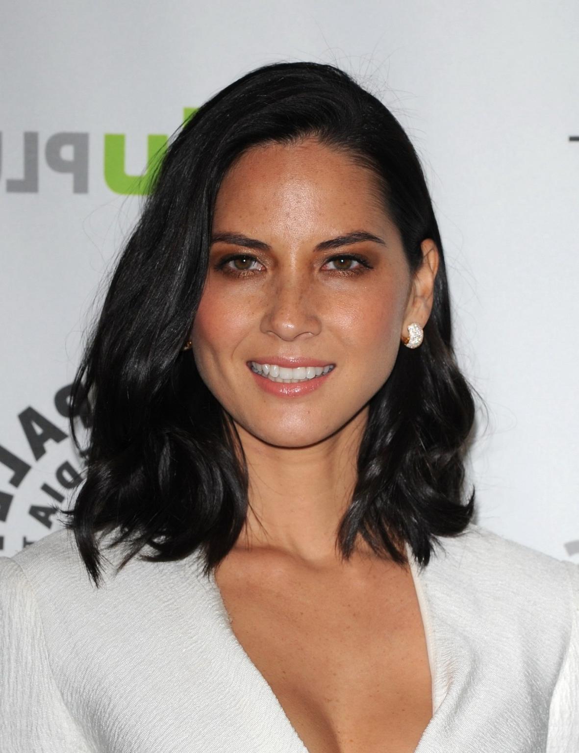 16P Olivia Munn leggy showing cleavage in white low cut mini dress at 2013 Paley Fes