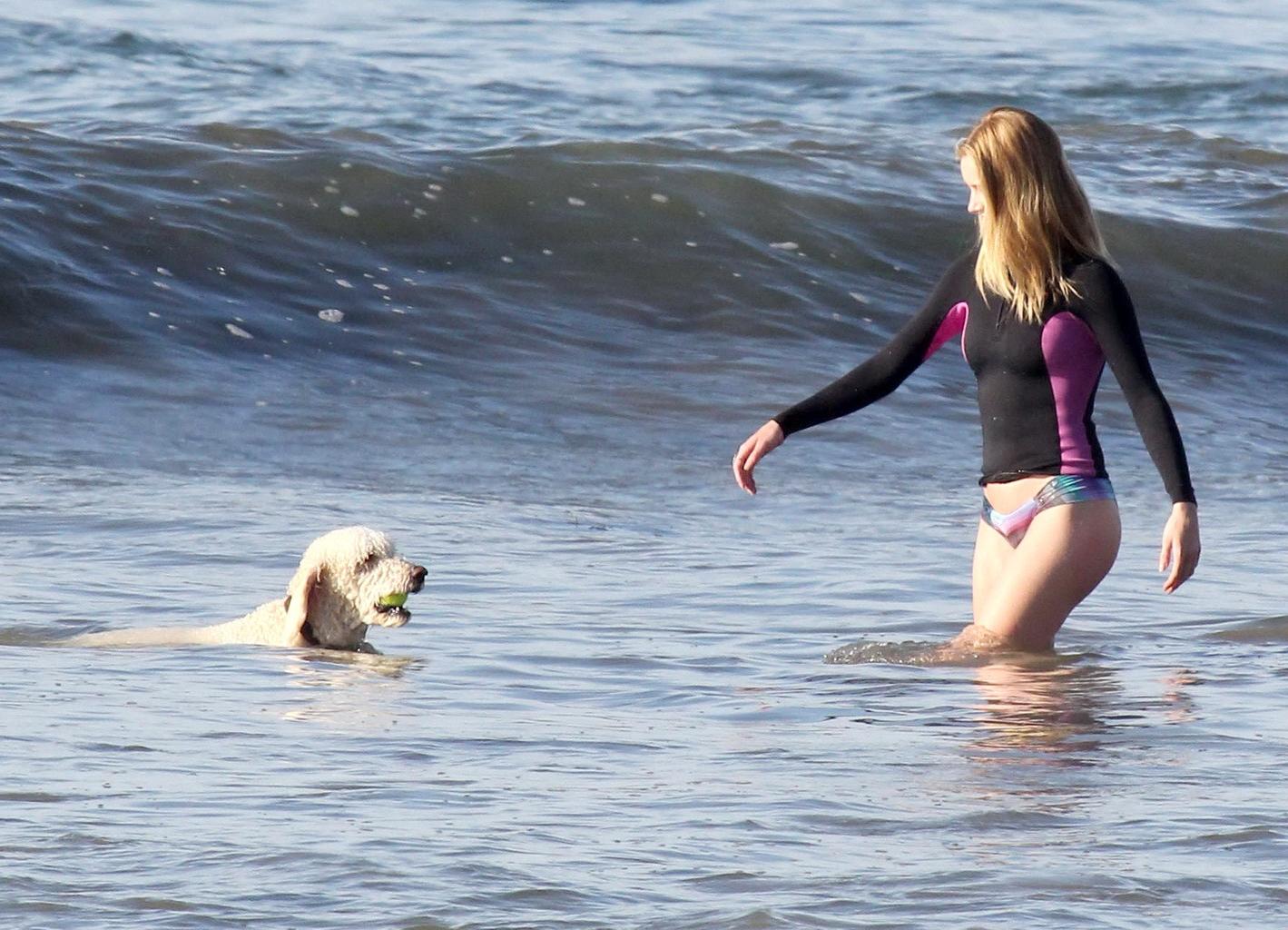 16P Rosie Huntington-Whiteley shows off her ass in bikini bottom while playing with 