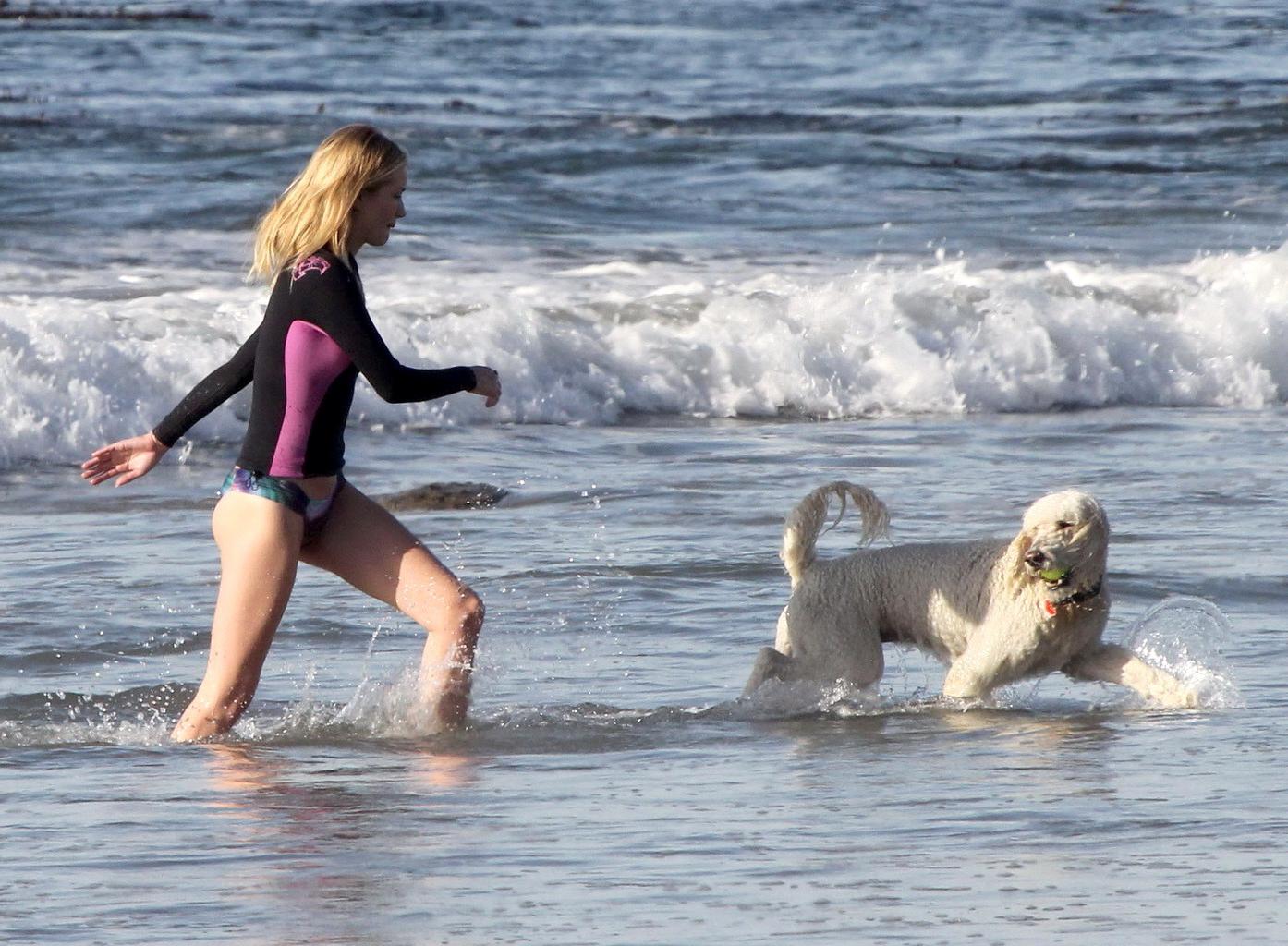 16P Rosie Huntington-Whiteley shows off her ass in bikini bottom while playing with 