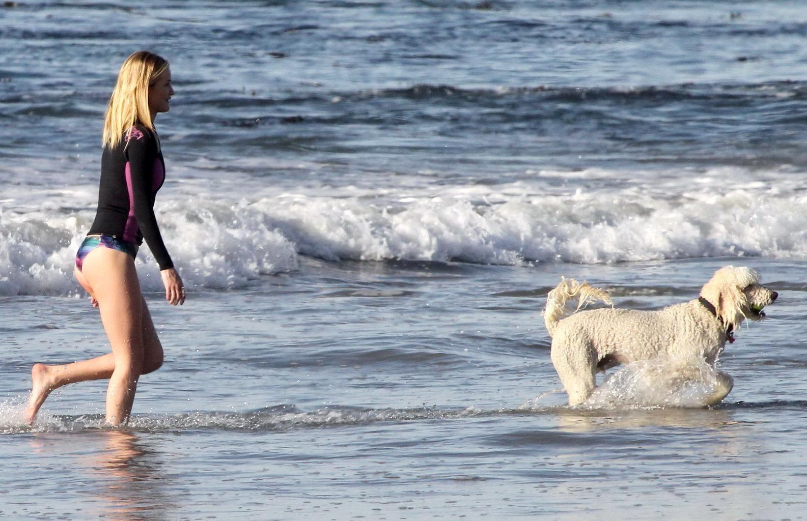 16P Rosie Huntington-Whiteley shows off her ass in bikini bottom while playing with 