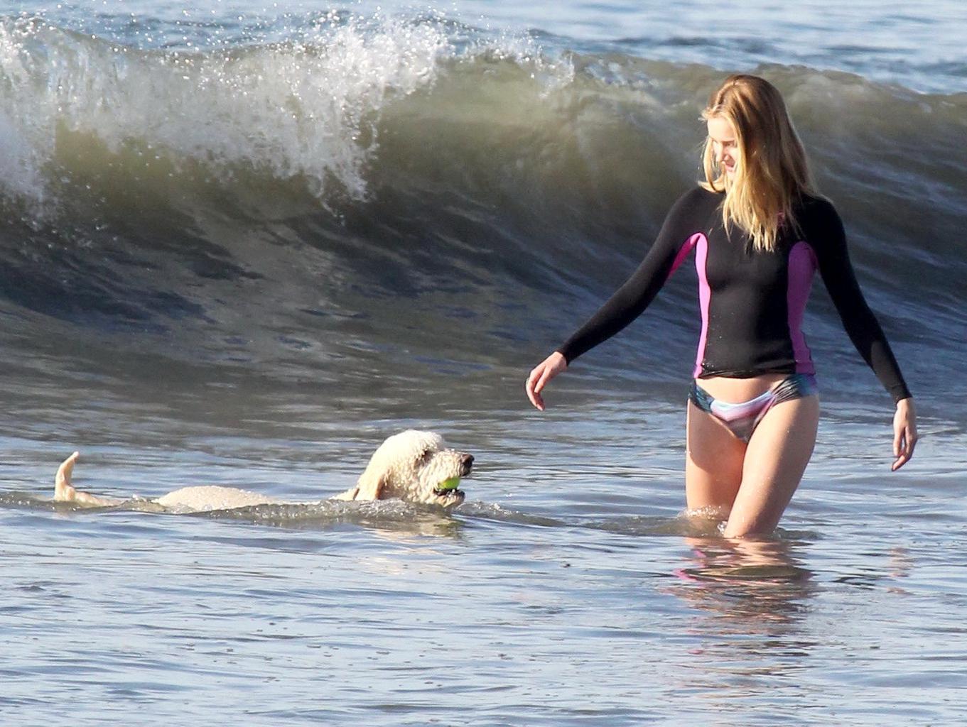 16P Rosie Huntington-Whiteley shows off her ass in bikini bottom while playing with 