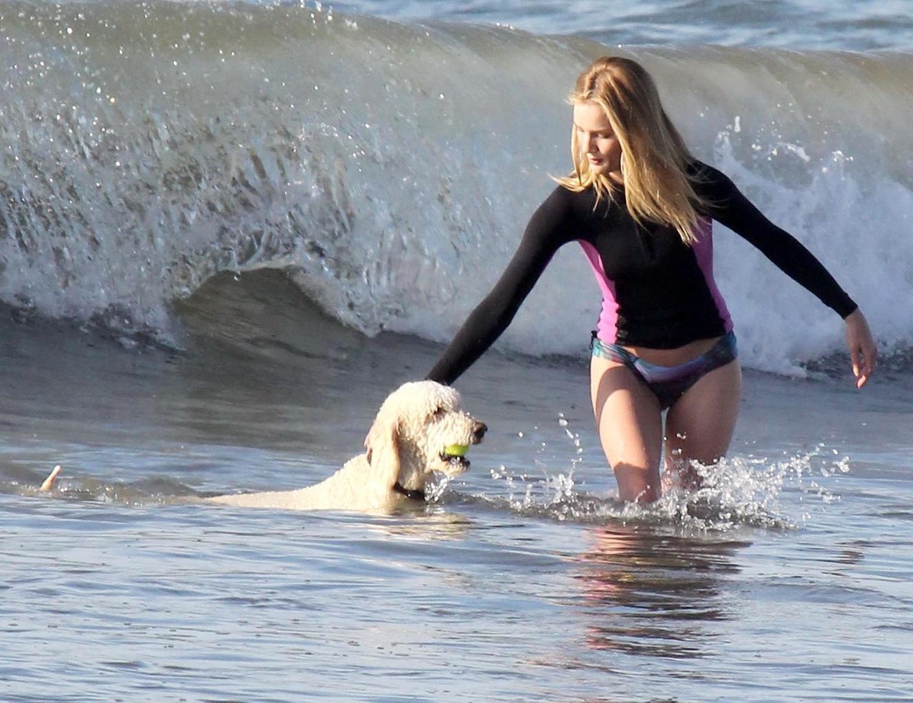 16P Rosie Huntington-Whiteley shows off her ass in bikini bottom while playing with 