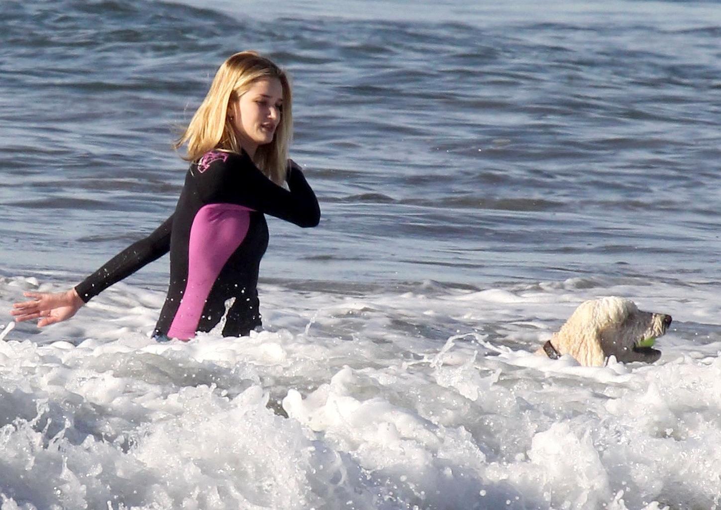 16P Rosie Huntington-Whiteley shows off her ass in bikini bottom while playing with 