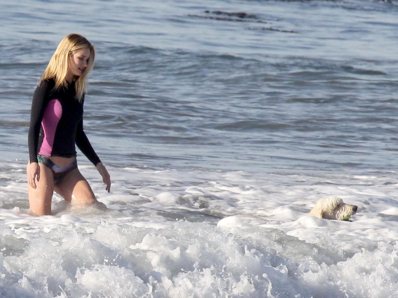 16P Rosie Huntington-Whiteley shows off her ass in bikini bottom while playing with 