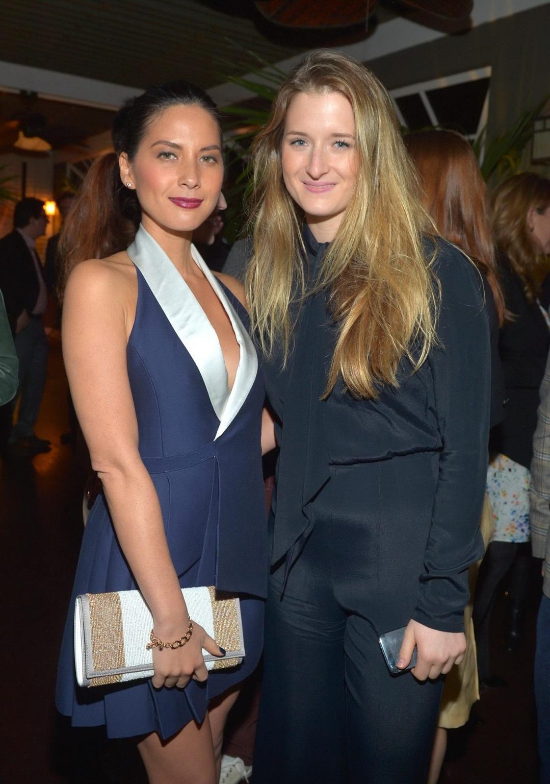 10P Olivia Munn showing huge cleavage at  Vanity Fair  Juicy Couture Celebration of 