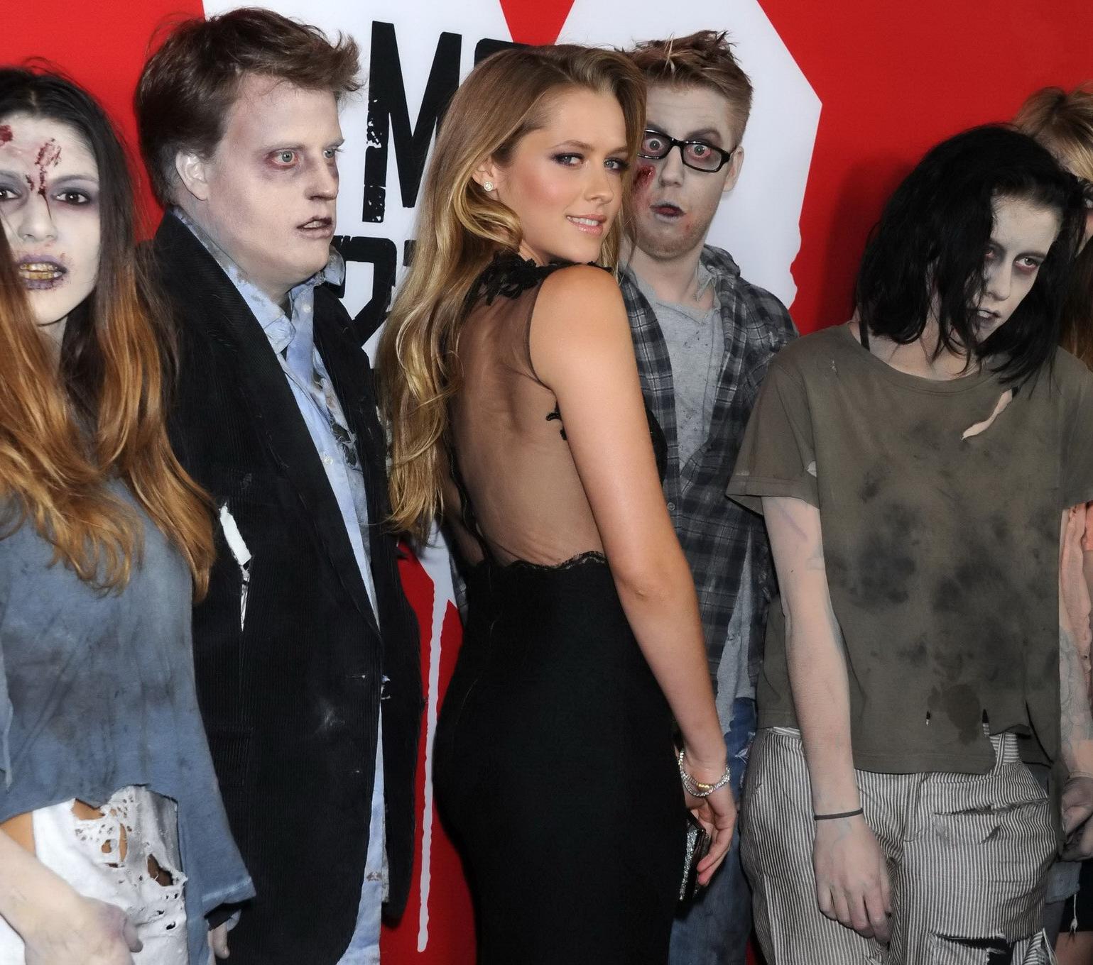 10P Teresa Palmer braless showing huge see-through cleavage at the Warm Bodies premi