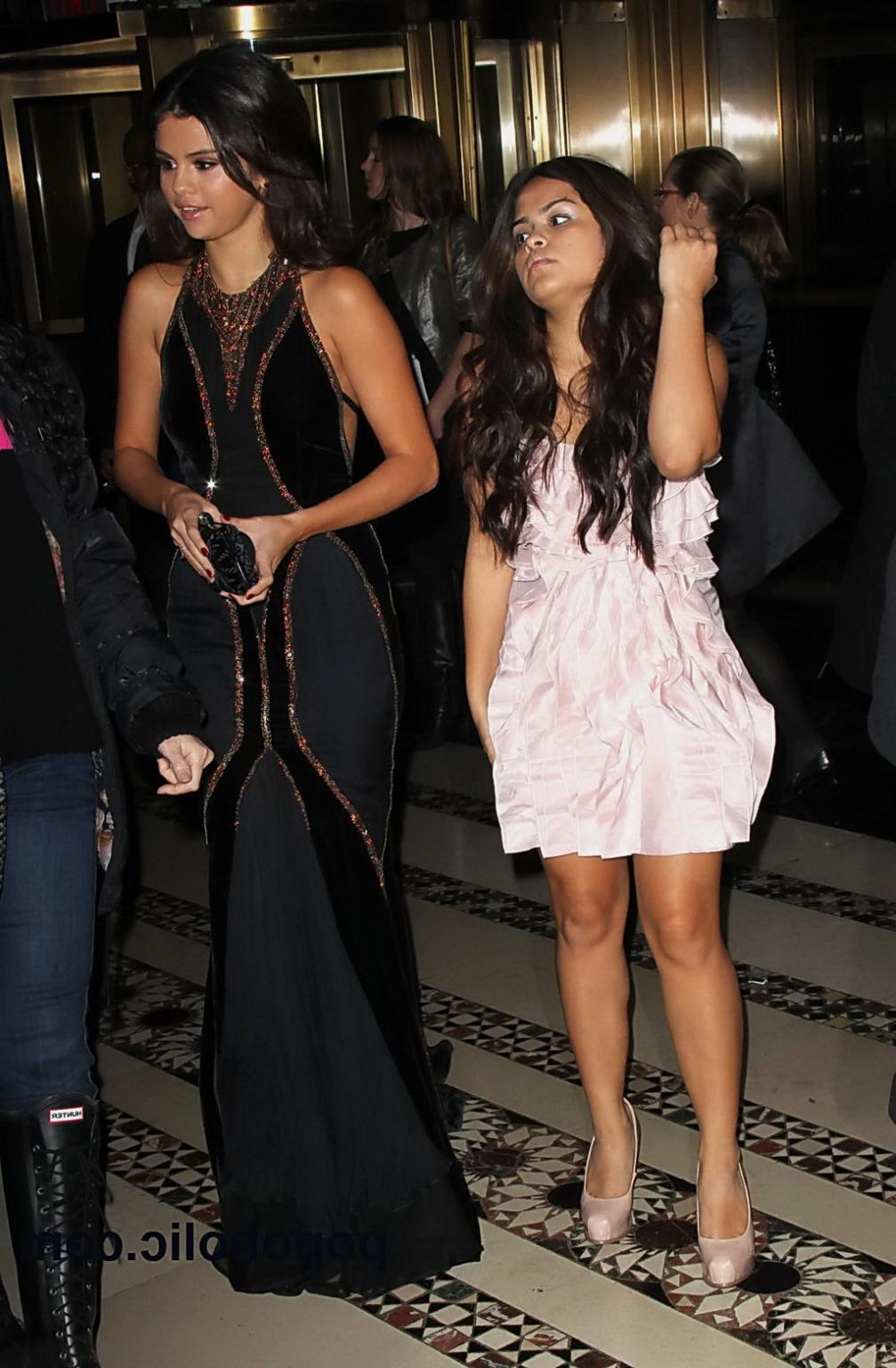10P Selena Gomez looking very hot in retro backless maxi dress at Unicef SnowFlake b