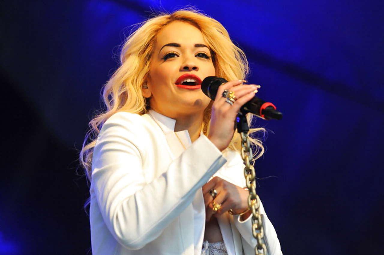 10P Rita Ora performing on stage and nipple slip paparazzi photos