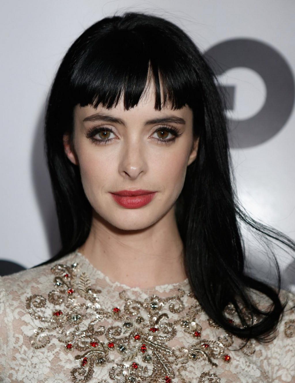 9P Krysten Ritter wearing a partially see through lace dress at GQ Men of The Year 