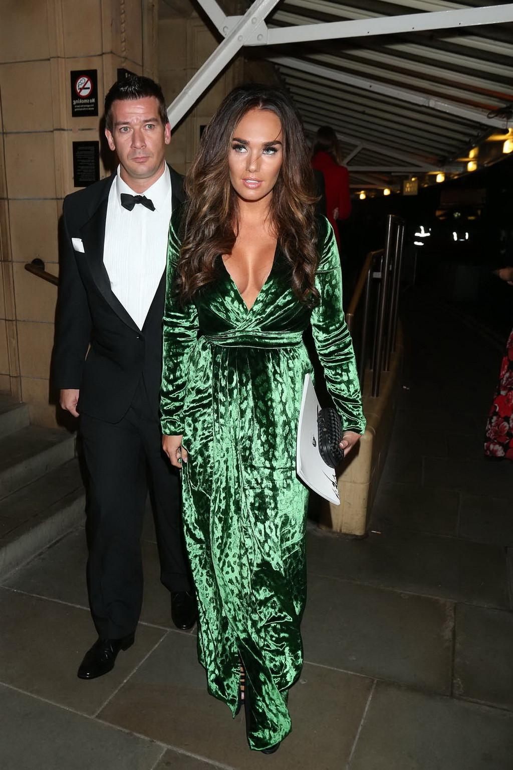 9P Tamara Ecclestone showing huge cleavage in a low cut green dress at the Skyfall 