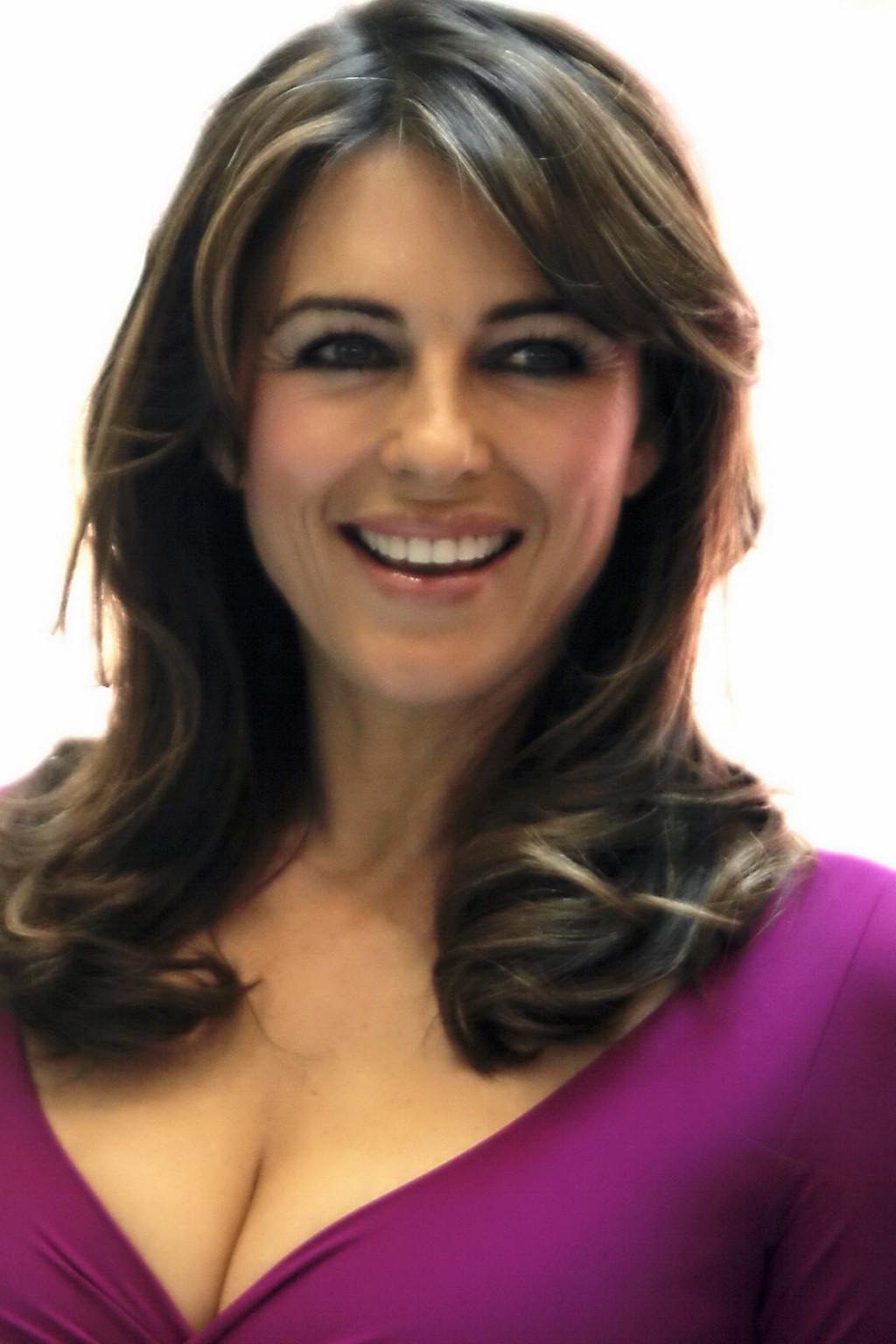 10P Elizabeth Hurley busty showing cleavage at Estee Lauder Breast Cancer Awareness 