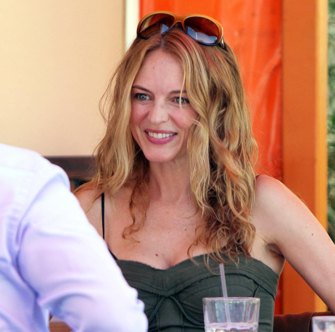 10P Heather Graham showing cleavage at the restaurant in Los Angeles