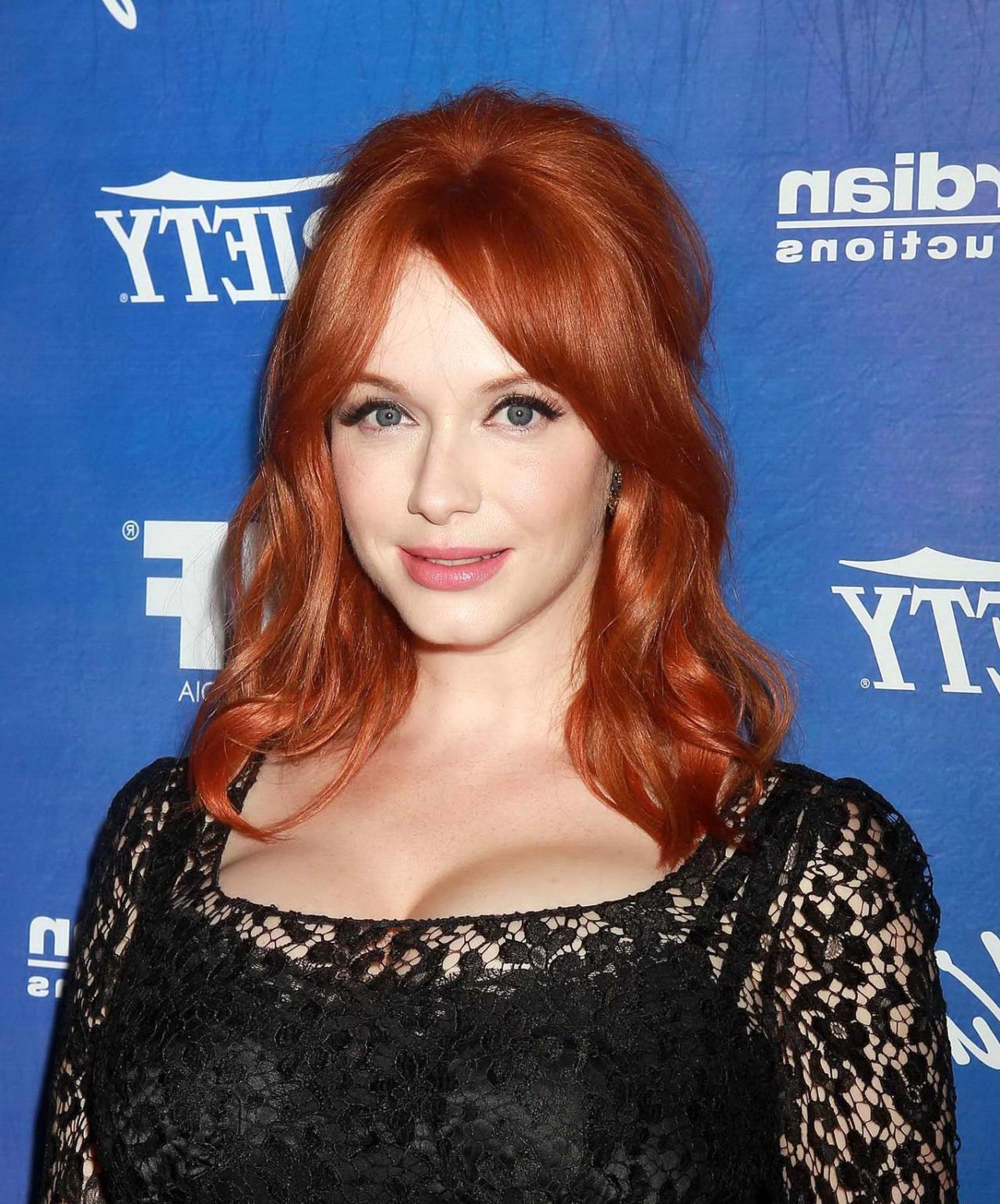 10P Christina Hendricks shows cleavage wearing a black lace dress at Variety Pre-EMM